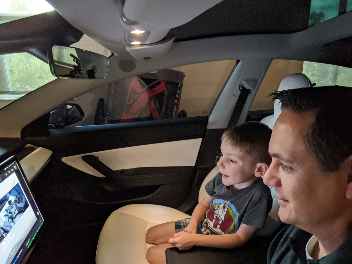 br_beck's tweet photo. Watching the @SpaceX launch from our Tesla. My 4 year olds idea, but a great one!  #SpaceX #Tesla #Model3 #USA https://t.co/I7pgEzBApW