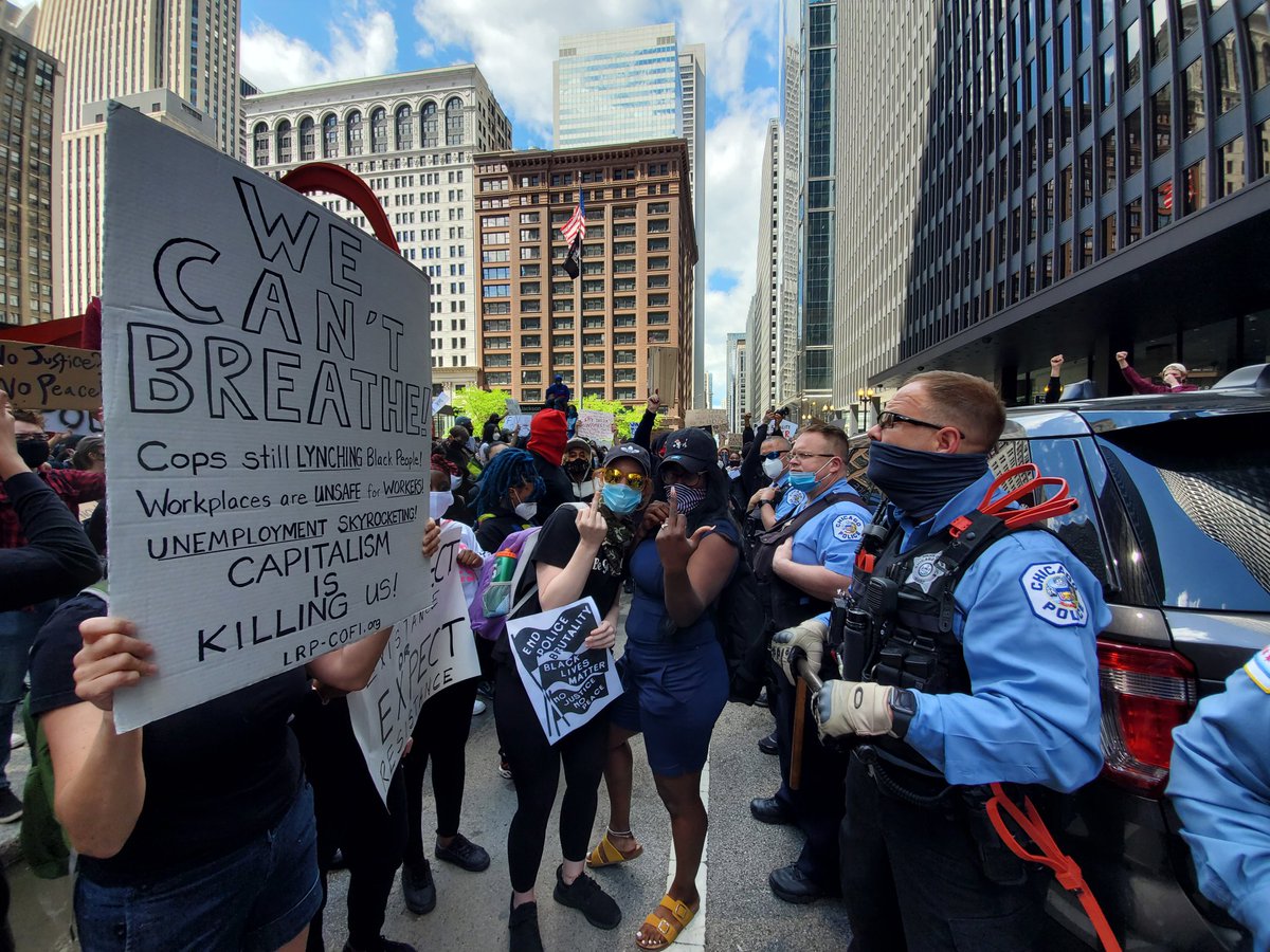 Bit of a stand off between protesters and police as cops surround a cop car near federal plaza.  #Chicago  #GeorgeFloyd