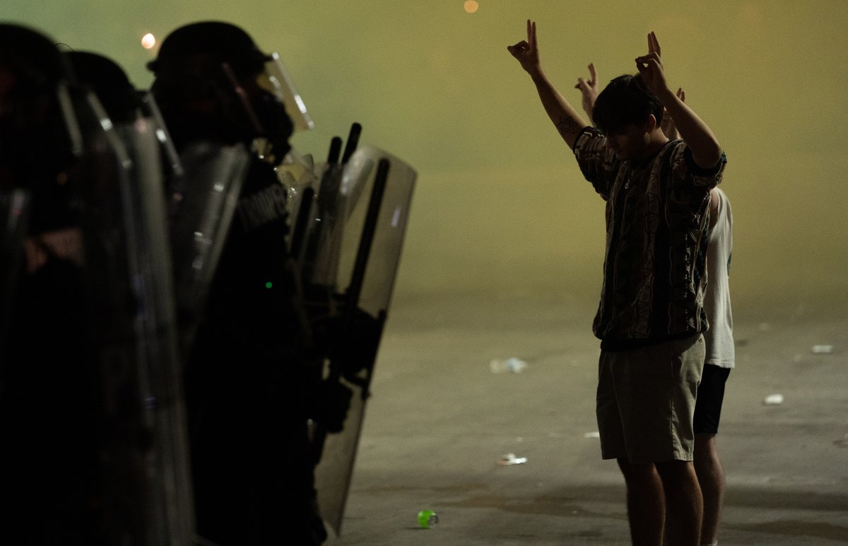 dylanwidger's tweet photo. Friday evening, I was on a boat with family fishing in Papillion. Later that night, I was fighting through tear gas clouds and angry crowds to being able to capture what is going on in our communities and around the country. A full gallery of the photos at https://t.co/FB6dnN7Bn8 https://t.co/eu2dLBvCQh