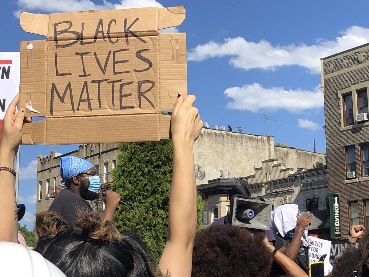 Chants of “black lives matter” erupt form the crowd.