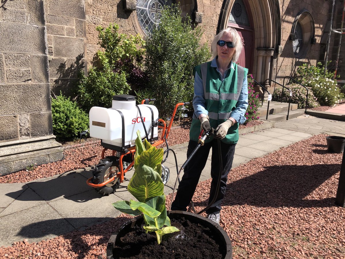 NBinBloom's tweet photo. Alex demonstrating how easy it is to use our new watering carts donated by ⁦@NBTrust⁩. It would be great to have new volunteers to help with watering. Can you spare a couple of hours a week? please get in touch #north berwick #volunteers #gardening https://t.co/gWYWP8H5L9