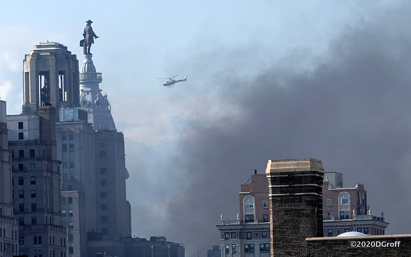 dgroff's tweet photo. smoke billows up from burning police cars near the front of city hall in #Philadelphia abt 5:30pm 5/30/20 after an afternoon of peaceful #GeorgeFloyd demonstrations. #BlackLivesMatter #philly #wmpenn #BLM https://t.co/gnulidDTLo