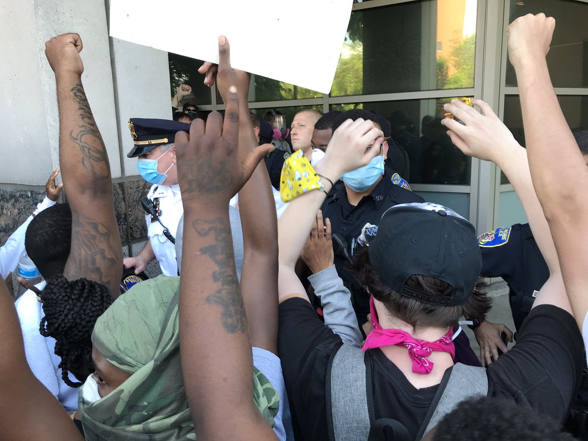 People are shouting “hands up, don’t shoot!” This is just outside the entrance to Baltimore Police HQ.