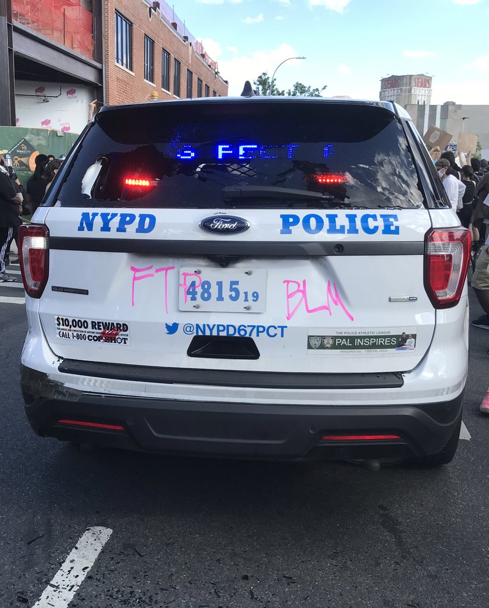 Two police cars in Brooklyn today: