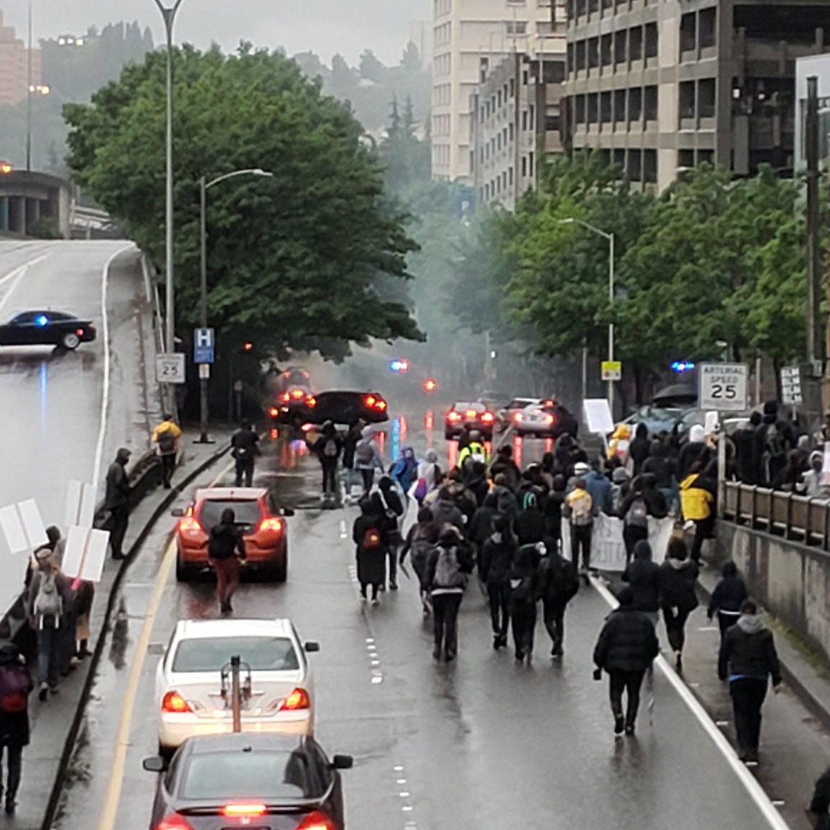 Just south of me: large cloud of tear gas. To the north downtown: black smoke from a reported car fire.  #seattleprotest  #GeorgeFloydprotest 1