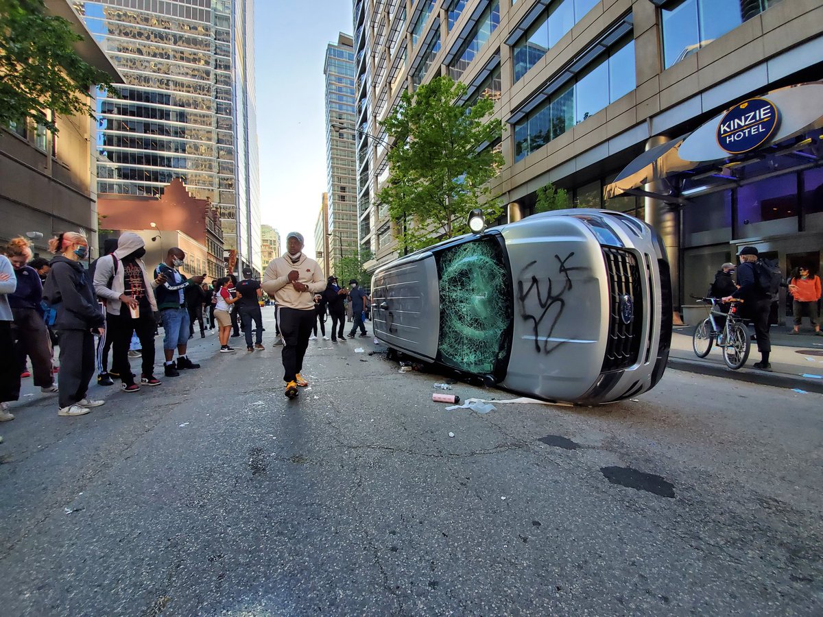 About 5 squad cars are damaged neare State ans Kinzie including one thats on its side.  #Chicago  #GeorgeFloyd