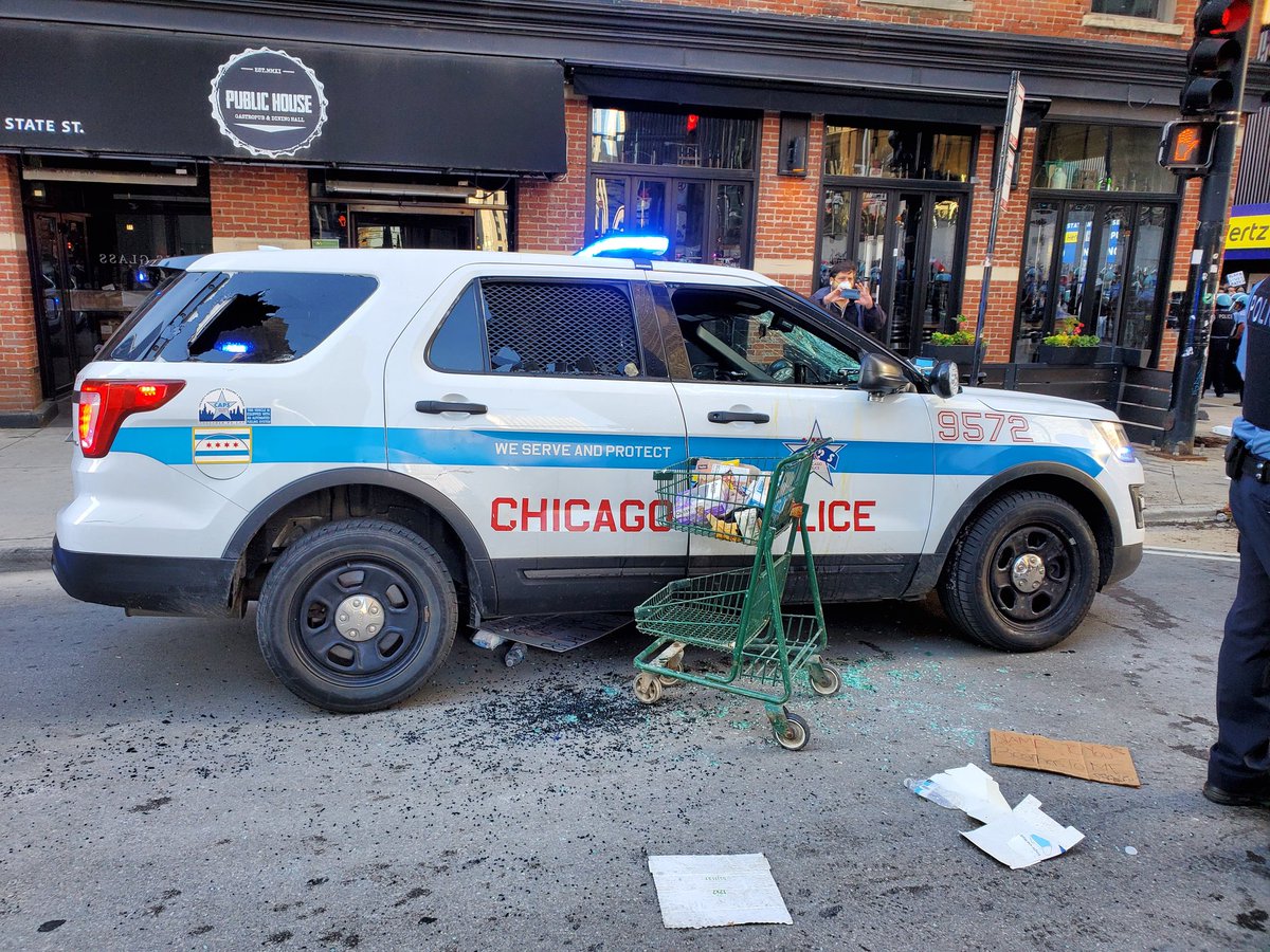 About 5 squad cars are damaged neare State ans Kinzie including one thats on its side.  #Chicago  #GeorgeFloyd