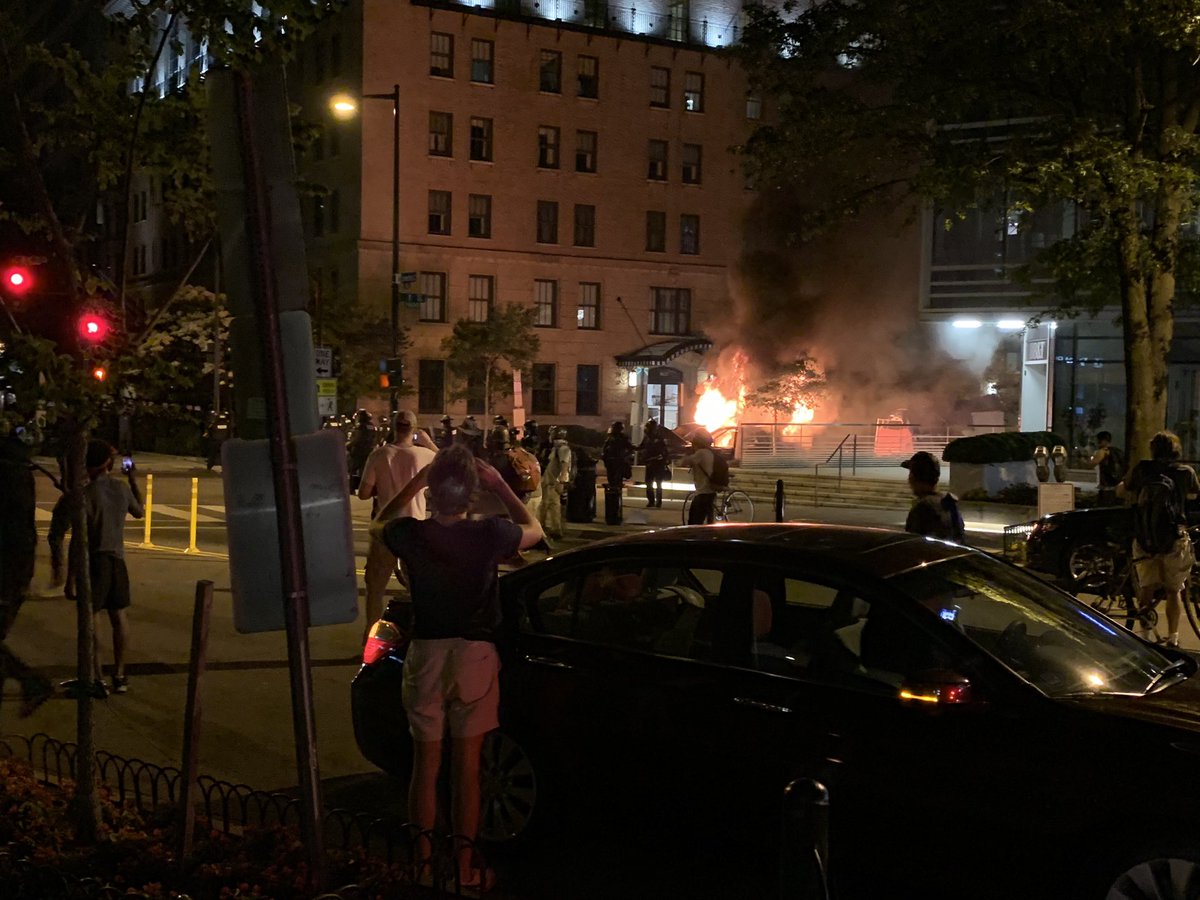 GarrettHaake's tweet photo. We’re into riot territory downtown DC. People smashing store windows on Connectictutt and I St. a car is burning https://t.co/zbx70mMBU5