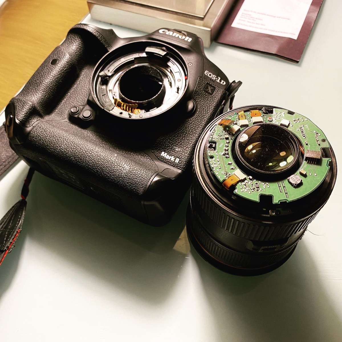 Photo of the camera that a man with a crowbar hit when he attacked me while working in Minneapolis today. A man dressed as a “Medic” with body armor, keep your eyes out.