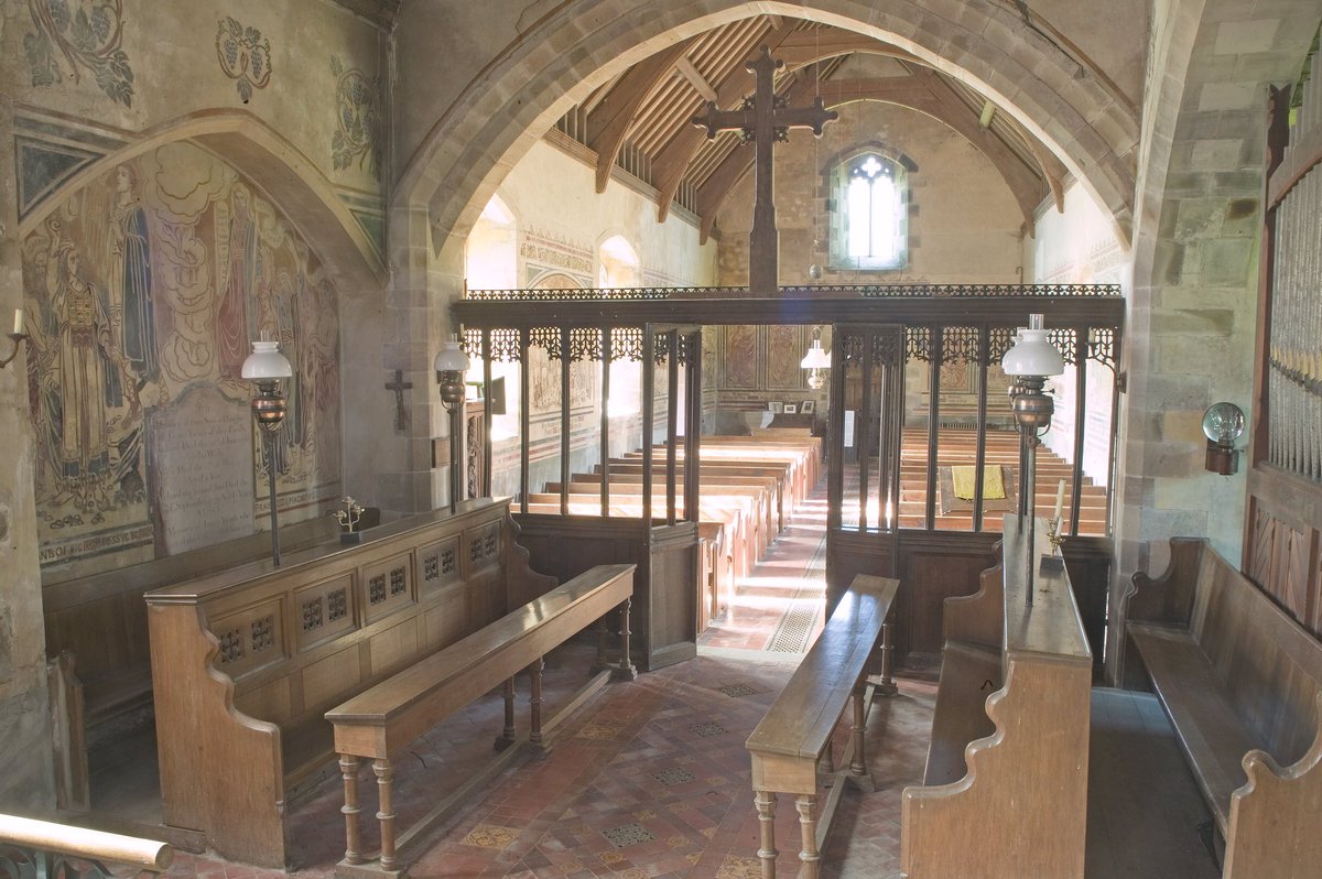 The 1888 sgraffiti interior steals the show at Llanfair Kilgeddin. Few stop to admire the medieval roodscreen. Little of the medieval church remains, but this small screen separating the nave from the chancel is a key survivor. The large cross was added in the 20th century8/10