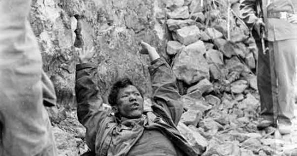 Yet another PLA trooper with his hands raised in surrender to the Vietnamese soldiers.Deng thought he could just steamroll into Vietnam, not realizing that the PLA was all huff and puff, but no real fight within.