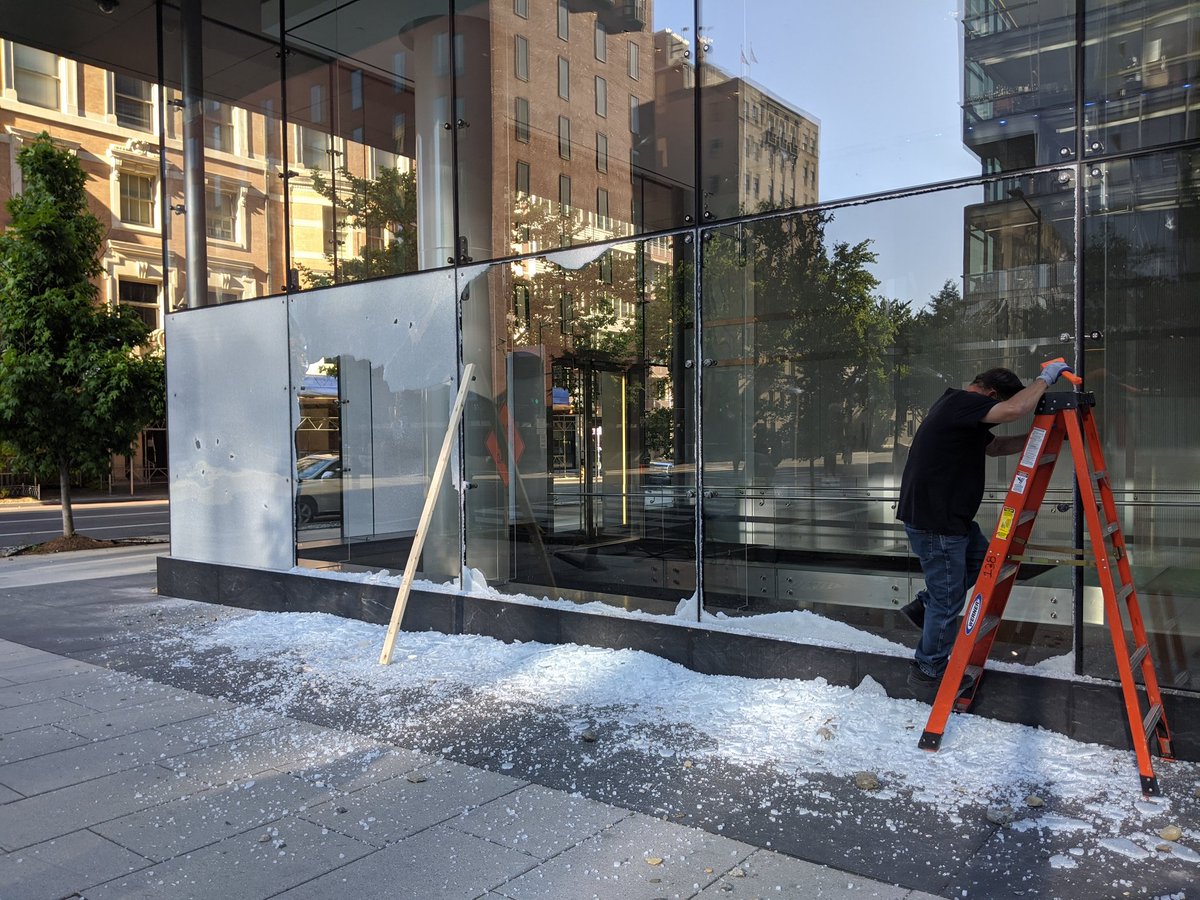 Smashed windows being replaced at PNC Place.