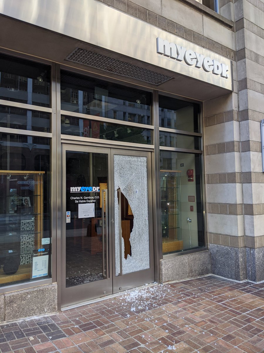 Smashed door at optometrist on 18th.