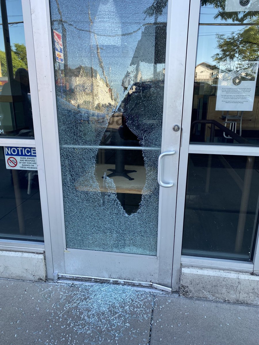 KARobinson__'s tweet photo. Damage to businesses on McMillan in Clifton overnight. Glass shattered. Doesn’t appear anyone was able to get inside. https://t.co/jR1Sm7jjvU