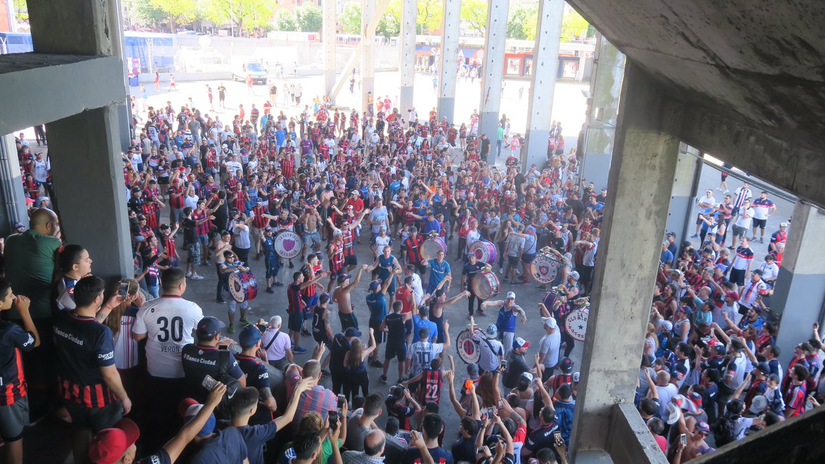 And then in come the La Gloriosa Butteler (Barra Brava) who arrive hanging out of buses with no windows (photos no allowed but it was best ever) and they start a party underneath their stand. Excuse the photo with me in it briefly running the show: