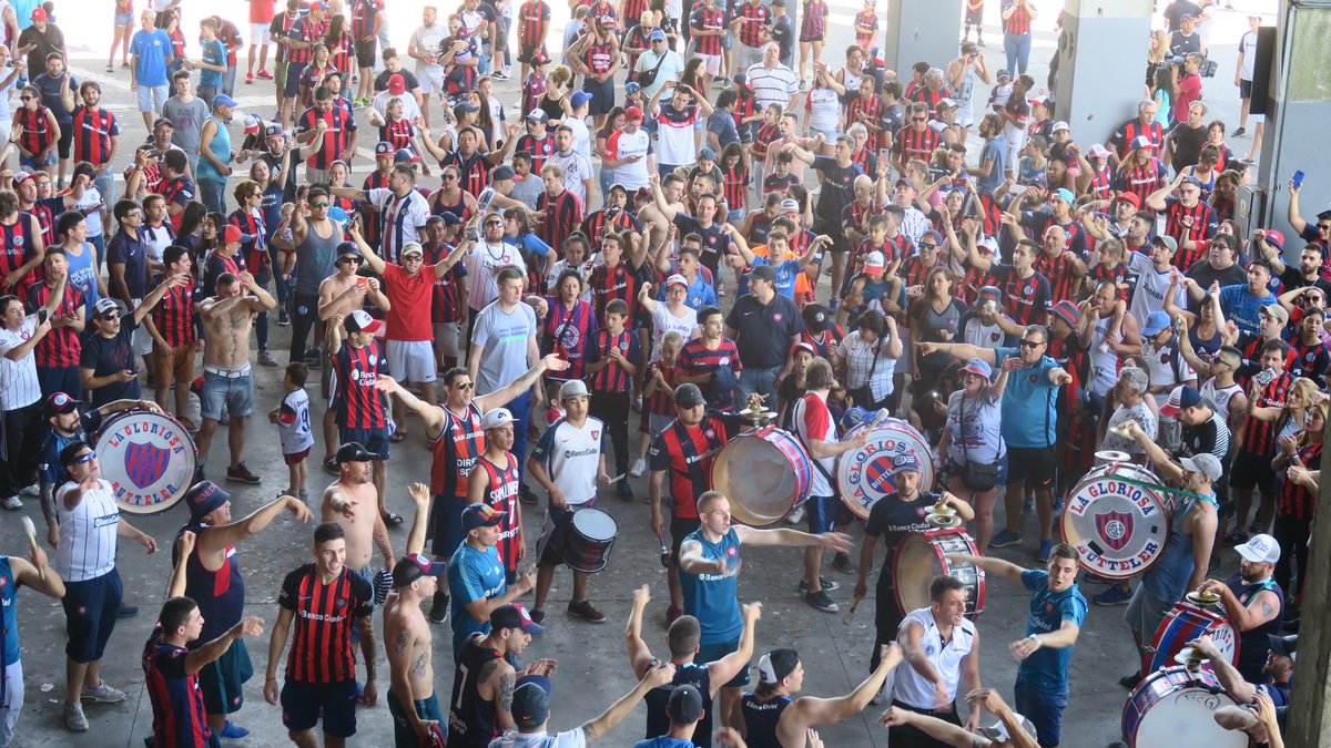 And then in come the La Gloriosa Butteler (Barra Brava) who arrive hanging out of buses with no windows (photos no allowed but it was best ever) and they start a party underneath their stand. Excuse the photo with me in it briefly running the show: