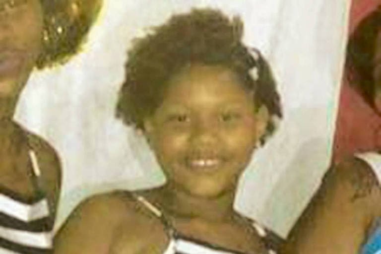 Jenifer Cilene Gomes, an 11 year old girl: Katia Cilene (her mother), was cooking, and Jenifer was sitting at the door talking to colleagues when plainclothes policemen,