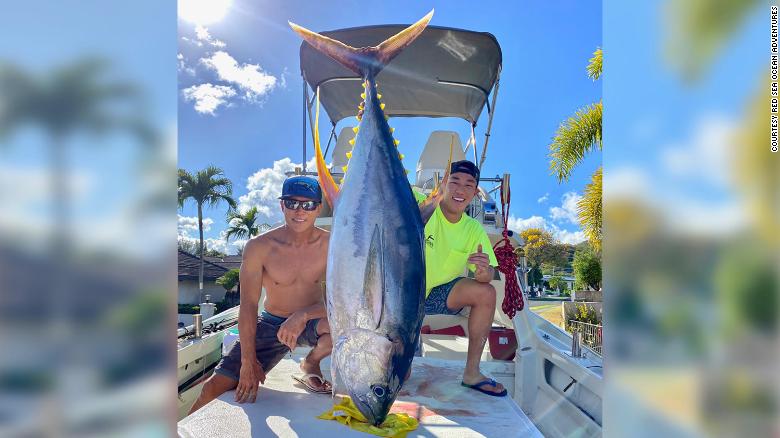 CNN's tweet photo. A group of fishermen in Hawaii caught 220-pounds of tuna and donated it to health care workers https://t.co/BYYXTdyjNO https://t.co/Z7MDT4wg6N