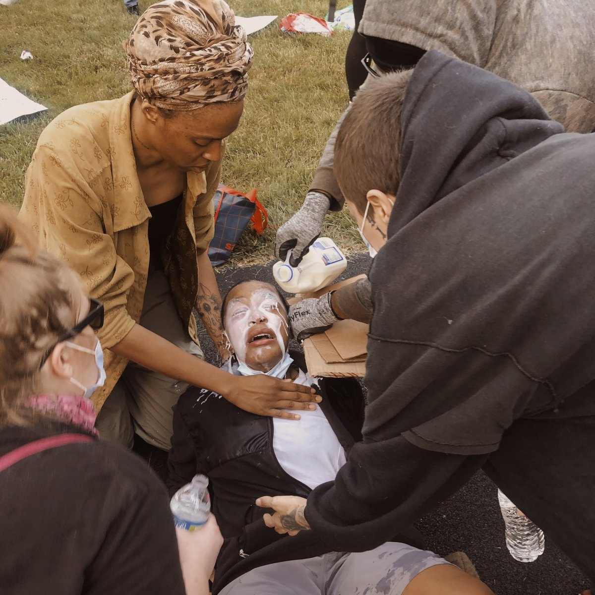 BarthelTaylor's tweet photo. #KCprotest 
we stand together , i want to give a big thanks to @BlakeBarnes12 for his random act of kindness (a lot of other people as well) for shielding me while they sprayed tear gas in my eyes, i want peace , i want love , i want our voices to be heard , is my brother next ? https://t.co/rbXOml7Mm8