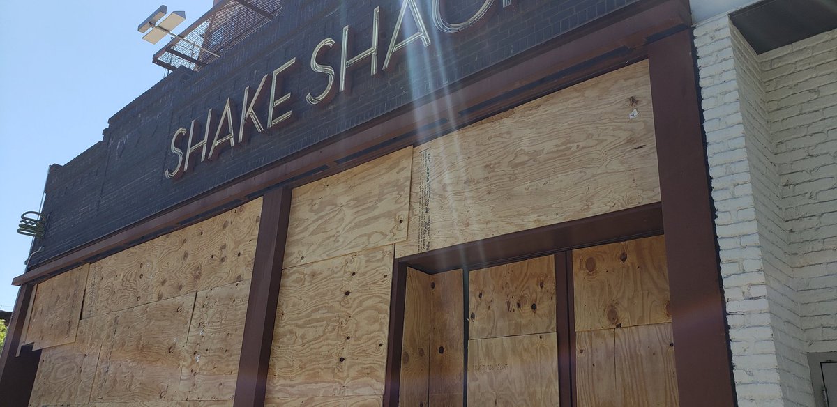 The shake shack has been completely boarded up but not the chick fil a next to it, which is a business that promises to support trump's re-election