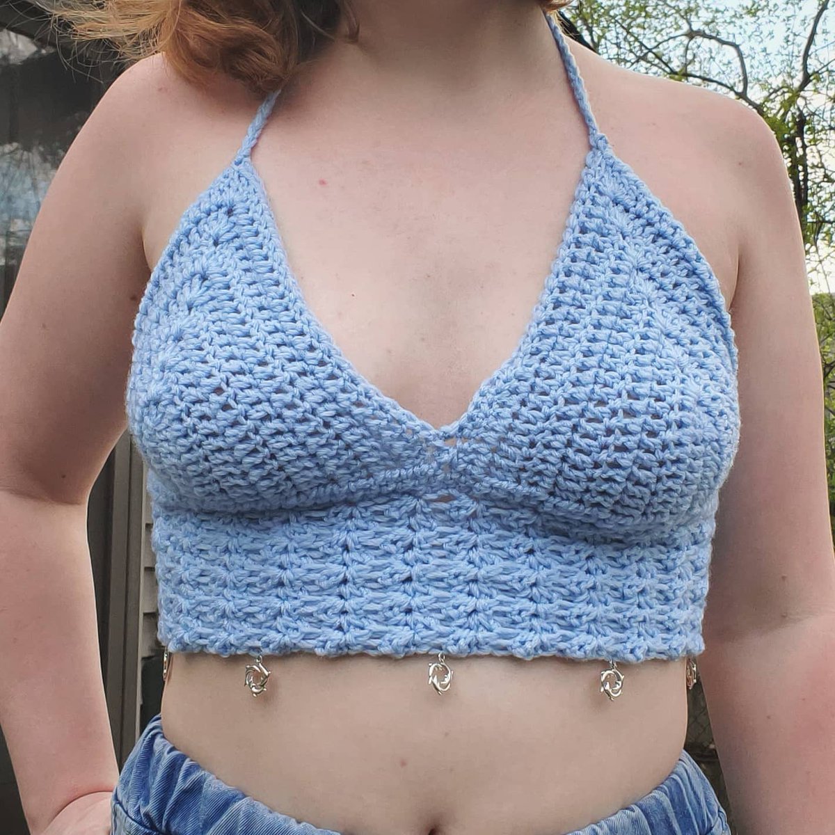 dolphin tank $24 + $5 shippingsize medium (C & D cup)model wears size 32Dlace up back and around neck for flexible sizing