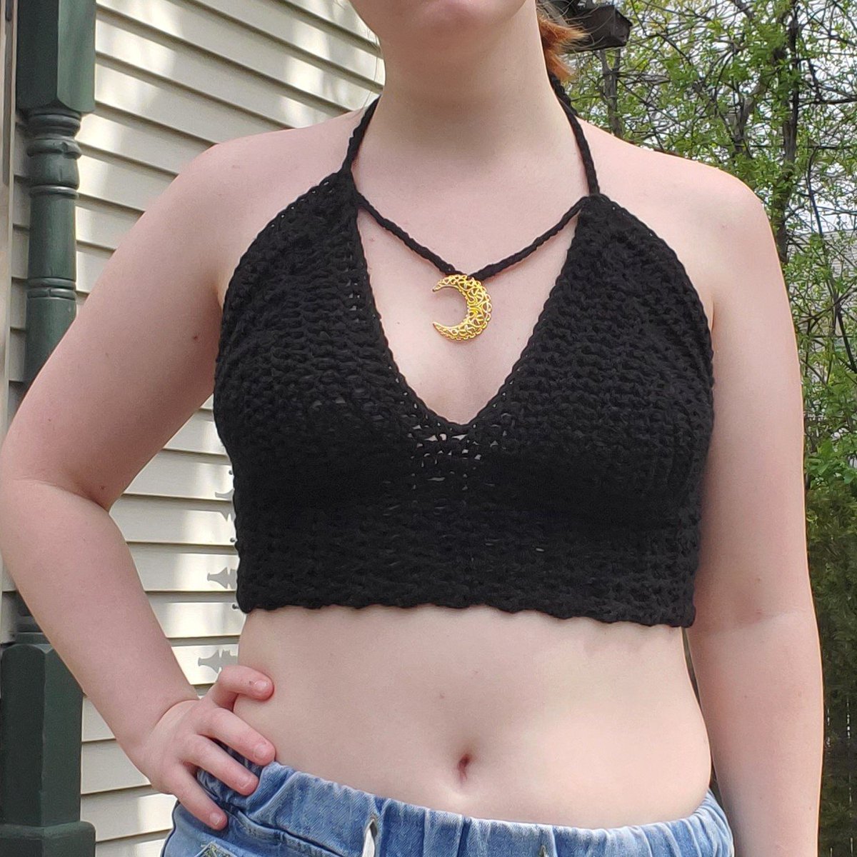 black moon tank $24 + $5 shippingsize medium (C & D cup)model wears size 32Dlace up back and around neck for adjustable sizing