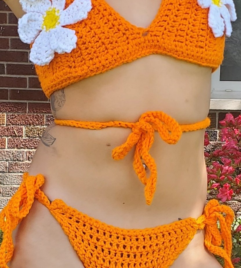 orange daisy bikini $36 + $5 shipping for set$24 + $5 shipping for top onlysize small/medium (B & C cup)model wears size 34B