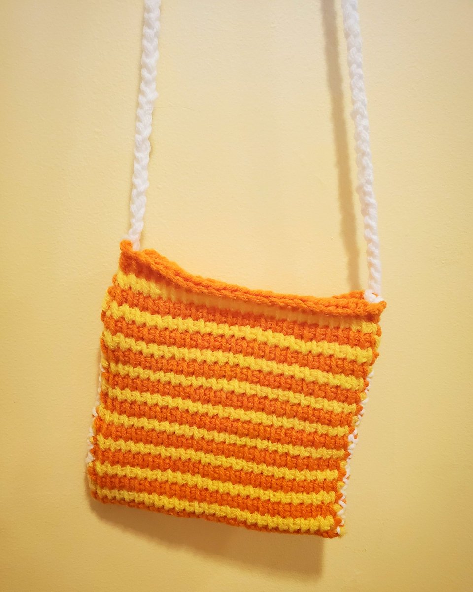 sunny handbag $12 + $5 shippinghas longer strap; can be worn crossbody or hang straight down from shoulder to hiptightly woven, durable material