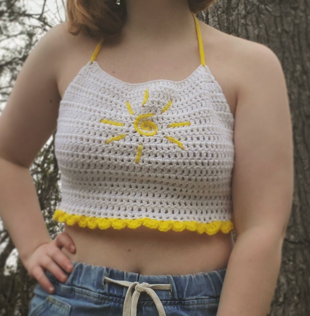 sunshine ruffle halter $20 + $5 shippingsize mediummodel wears size 32Dlaces up in back and around neck for flexible sizing