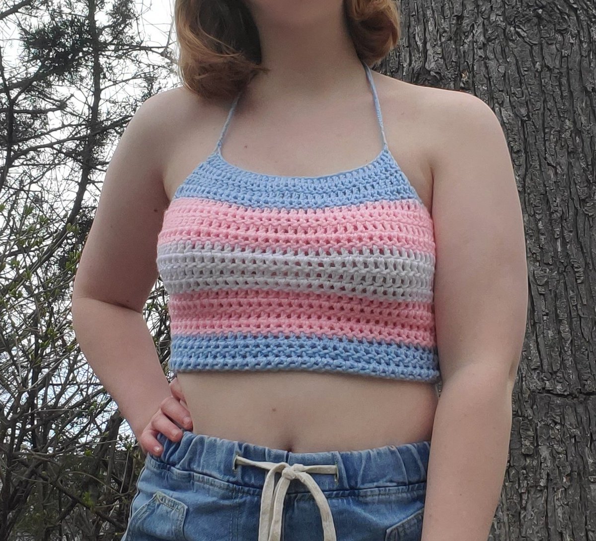 transgender pride flag halter$20 + $5 shipping size mediummodel wears size 32Dlaces up in back and around neck for flexible sizing