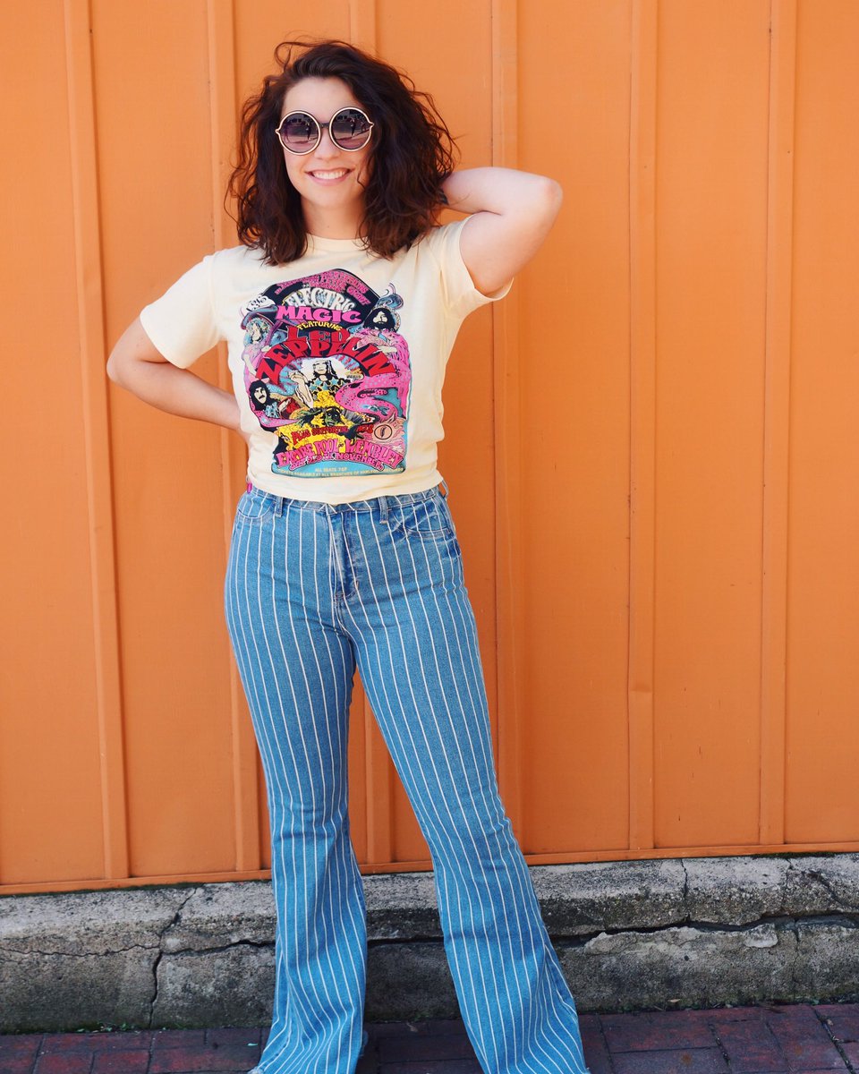 SaintsBoutique's tweet photo. Feeling’ fine in our Zeppelin graphic tee, Sunnies,  and Coachella Bell Bottoms 🖤💥 available in store and online! #saintsboutique #saintsboutiquedport #saintsstyle #graphictee #bellbottoms #hippiestyle #goodvibes #boutique #festivalszn https://t.co/hBJPzBuGPn