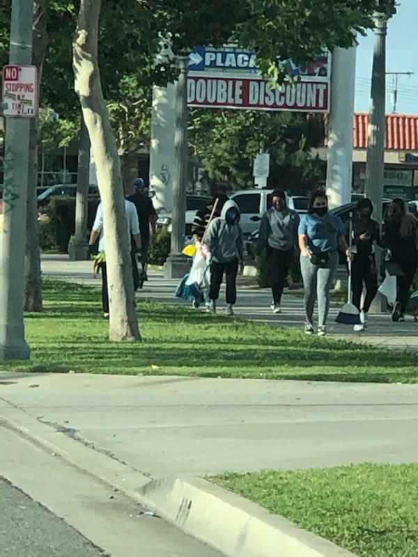 SantaAnaPD's tweet photo. After a night of civil unrest and senseless property damage, it is our very own Santa Ana community that has come out early this morning to help with the clean up efforts, along with @CityofSantaAna crews #SantaAnaSTRONG https://t.co/QSmgpWMIGK