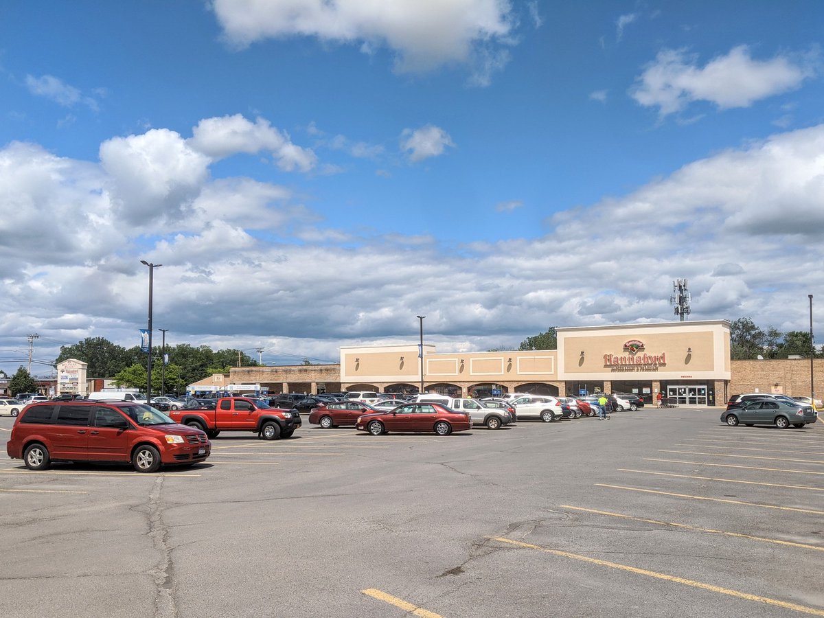 Across from a stretch of the rail trail is a large strip mall, or "the Plaza". It houses one of the larger chain grocery stores in the region.