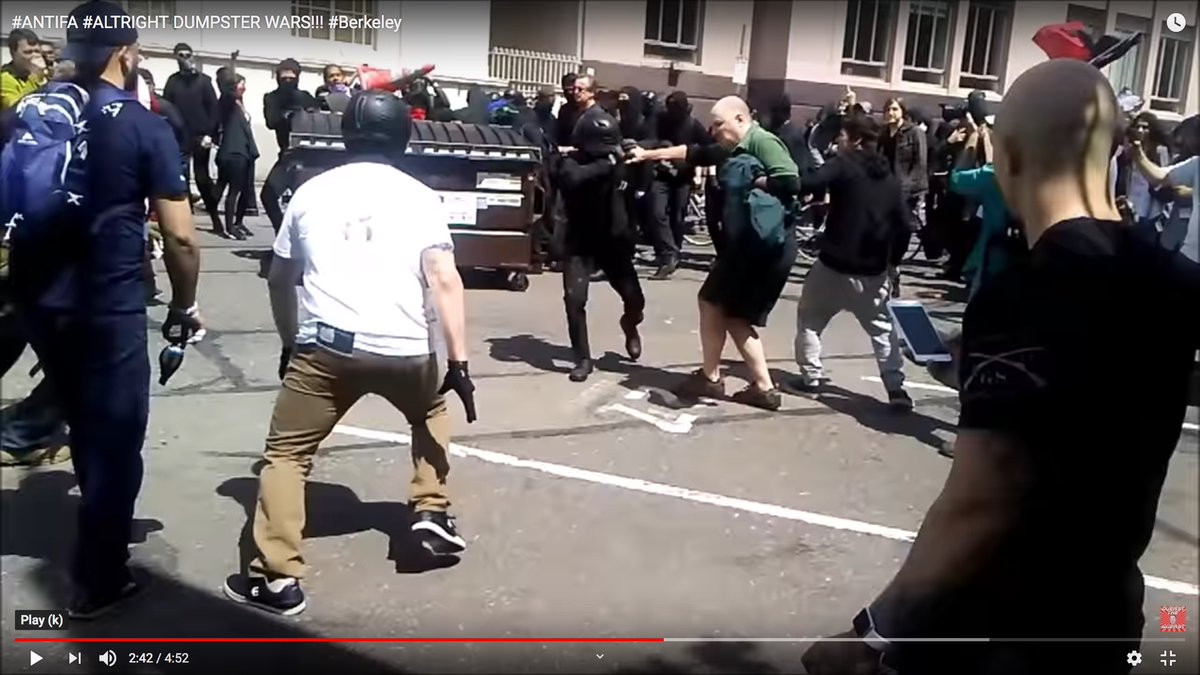 The Antifa attacked, and the bald man tore off his mask and goggles.