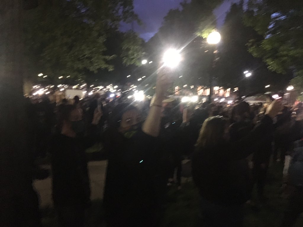 The crowd still on the common has lit up the night, using hundreds of cell phones as lights in a less fire prone version of a candlelight vigil.  #BostonProtest