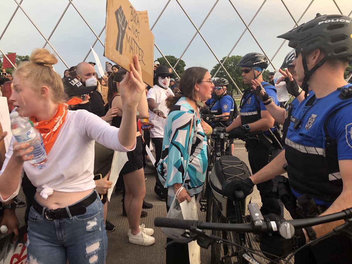 Recap. Protesters started downtown, marched peacefully for about 2 hours. Now, we’re on Trinity Bridge. officers blocking protesters from going to West 7th (lots of businesses there). Leaders tried to get ppl to leave, but many will not, say theyre peaceful.  #GeorgeFloydprotest