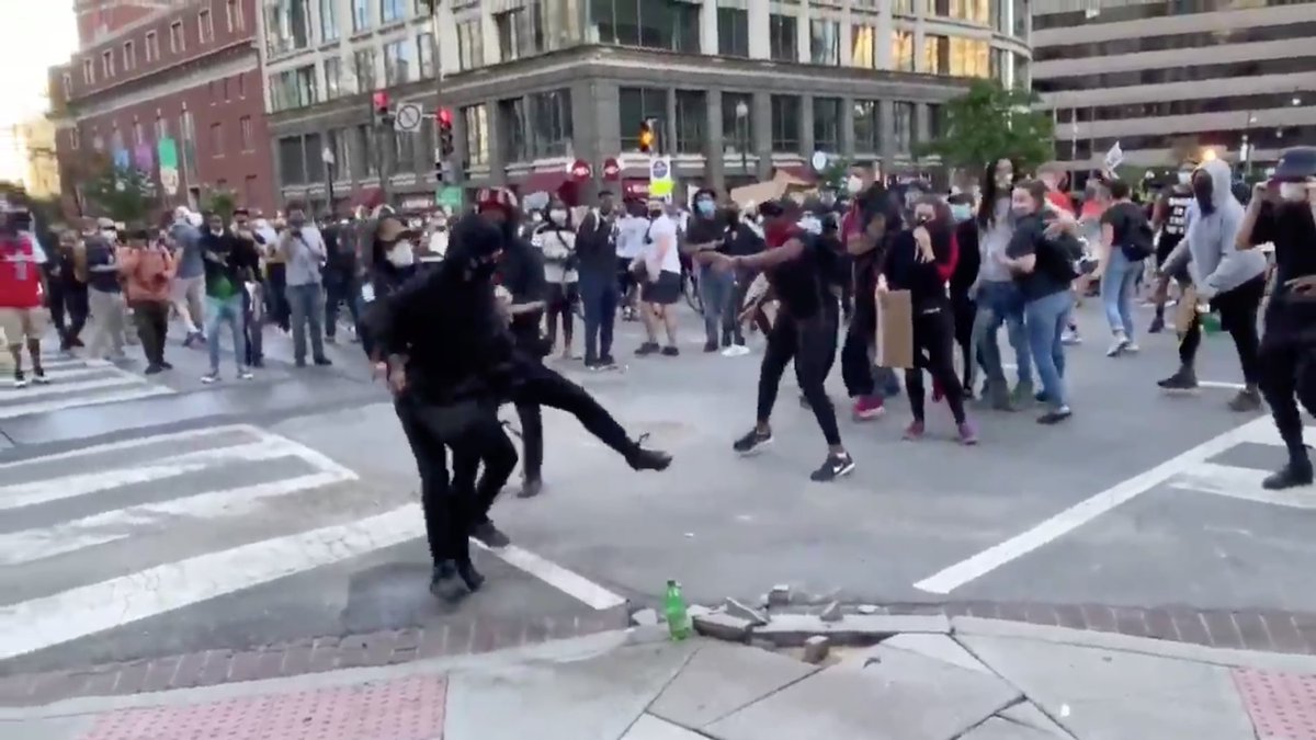 The primary grabber gets Antifa in quite an armlock, lifting him off the ground.The primary grabber is obviously MUCH stronger than he appears.