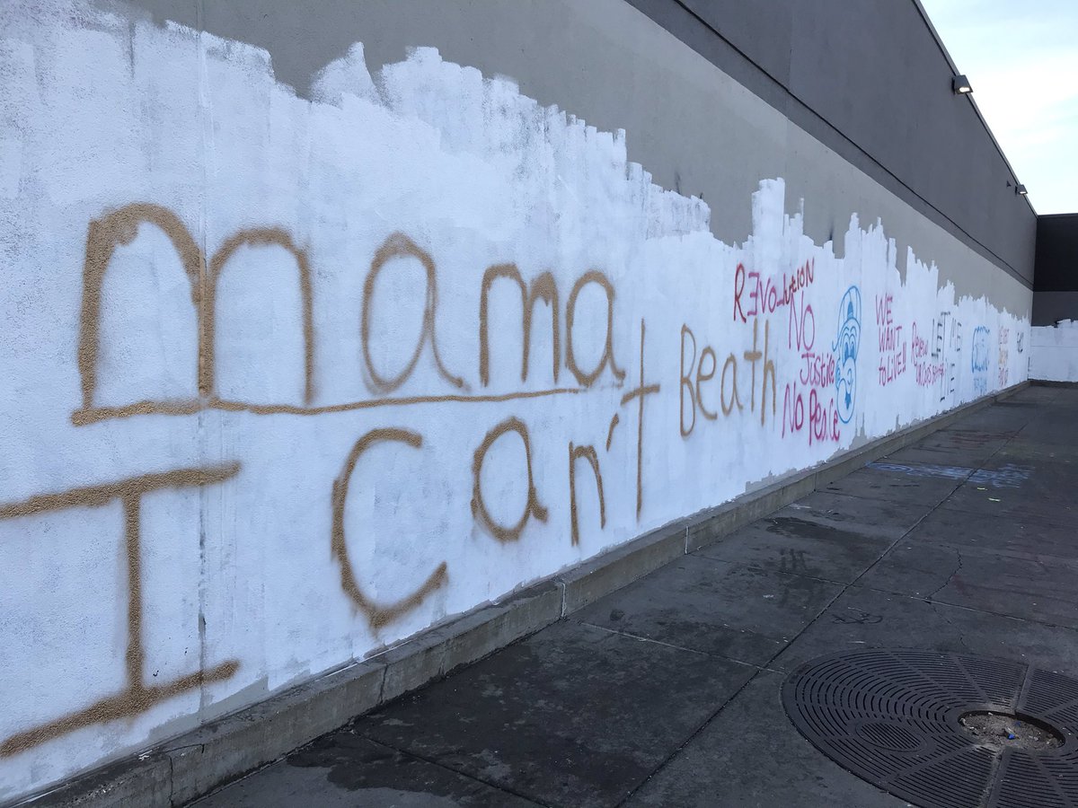 They’re trying to paint over the graffiti but it returns