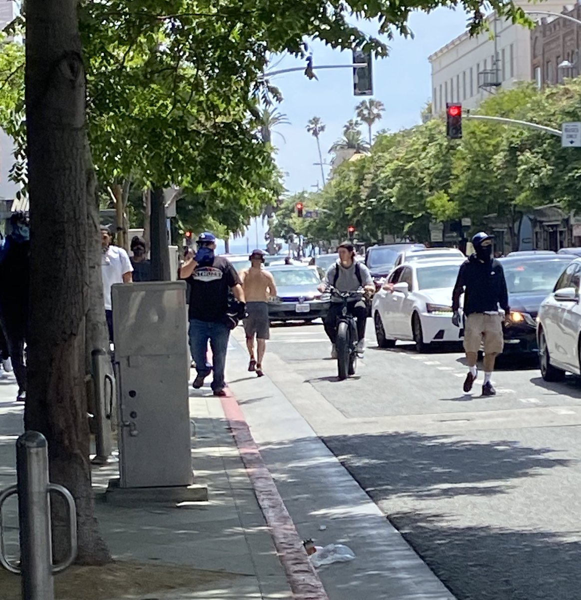 And in the most Santa Monica thing ever, a shirtless dude on his run down the street toward the beach as SWAT teams show up and workers board up Nordstrom