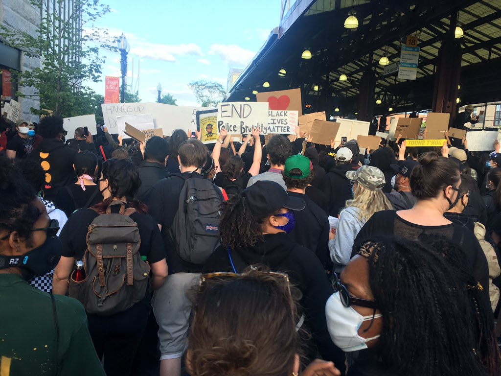  #BostonProtest crowd moving out slowly. Hard to see extent of crowd; fully filling multiple blocks of street with chants of "no Justice, no peace" and "I can't breathe". Limited police presence; no uniformed officers in sight (thankfully).