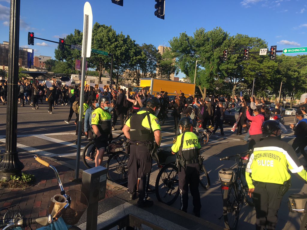 Passed two dozen or so cops from the special ops bike unit at Melnea Cass. Street is blocked off by volunteers and police as more than a thousand protesters filter by.