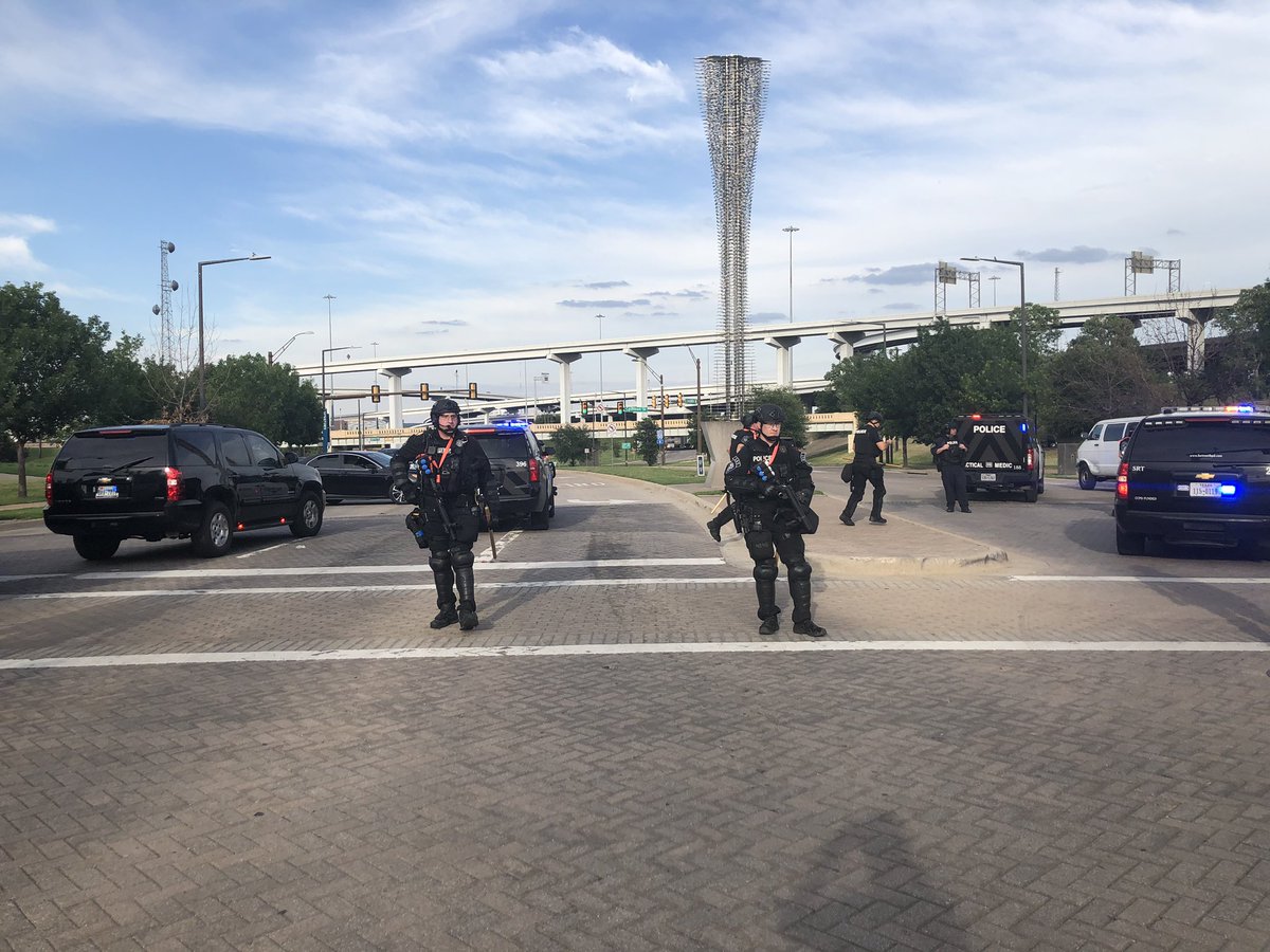 It’s mostly cops on bikes who are visible as we march. But when protesters got close to the interstate, officers in riot gear seemed to come out of nowhere to block the intersections. Protesters turned away on the planned route.