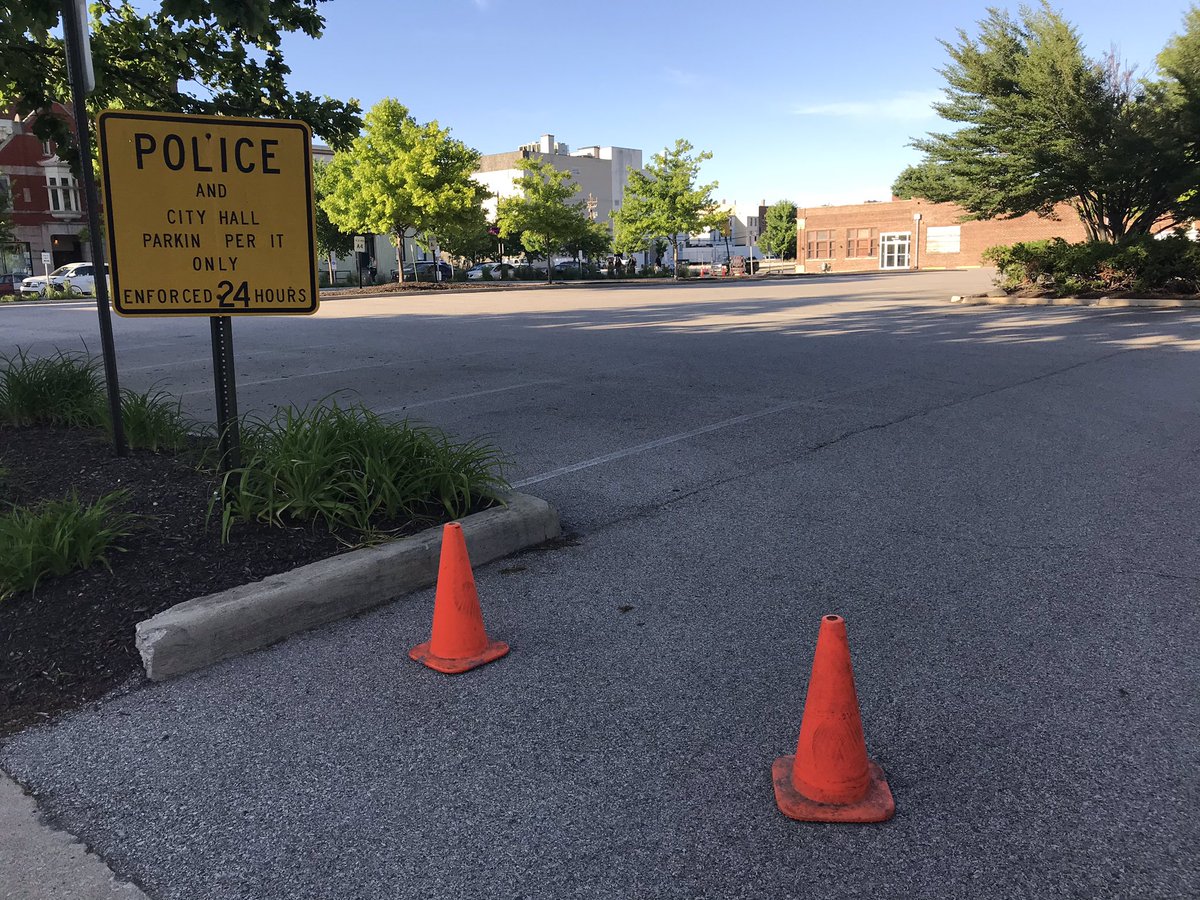 This parking lot onSictg Street is typically filled with Lafayette Police vehicles and city cars. Empty tonight behind the orange cones.