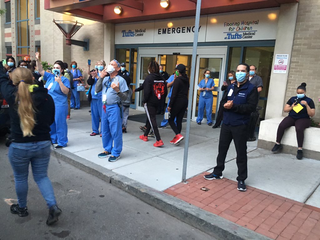 As we pass Tufts Medical, dozens of medical staff clap for the protest, while those marching clap far louder in support of the Frontline medical workers keeping people alive.  #bostonprotest