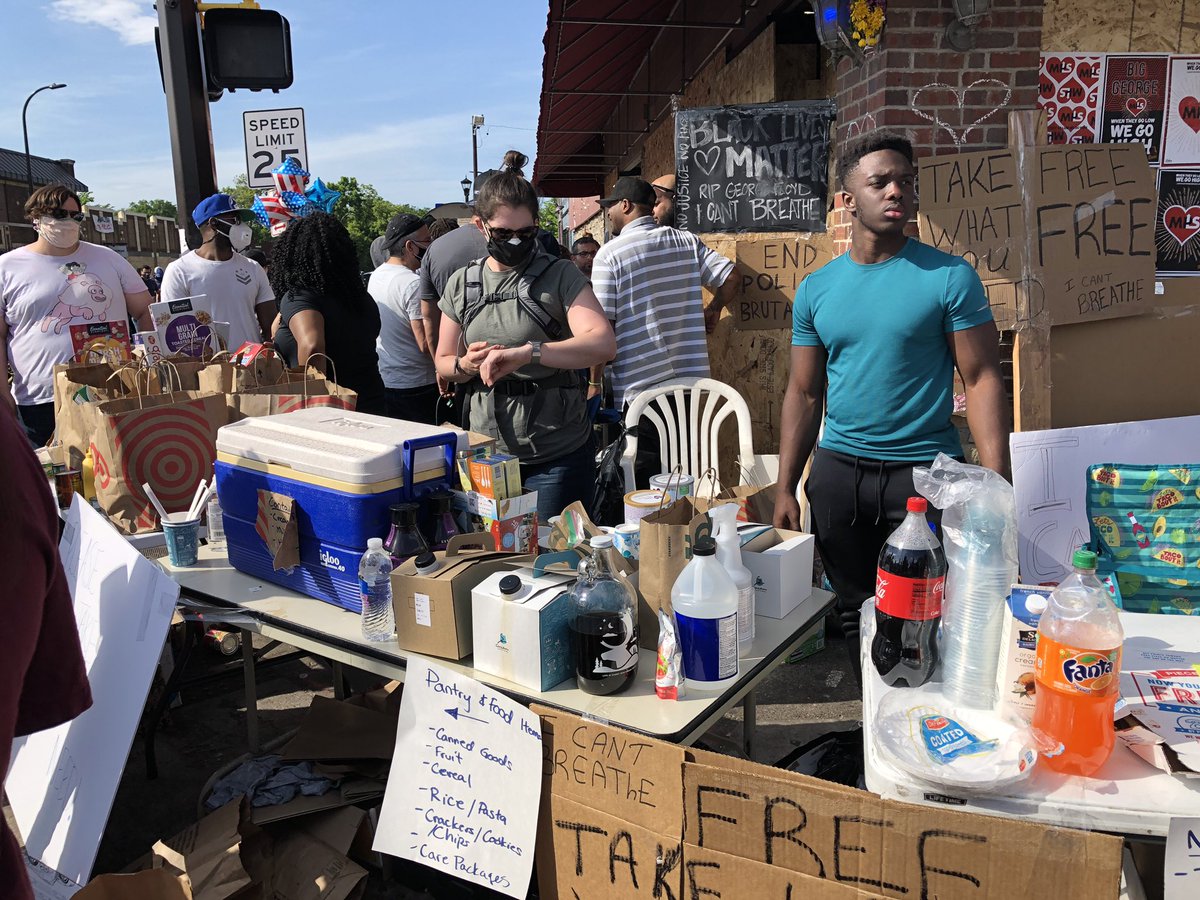 All along Lake St and here too volunteers are distributing donations of food, water and clothes. It feels like the day after a natural disaster