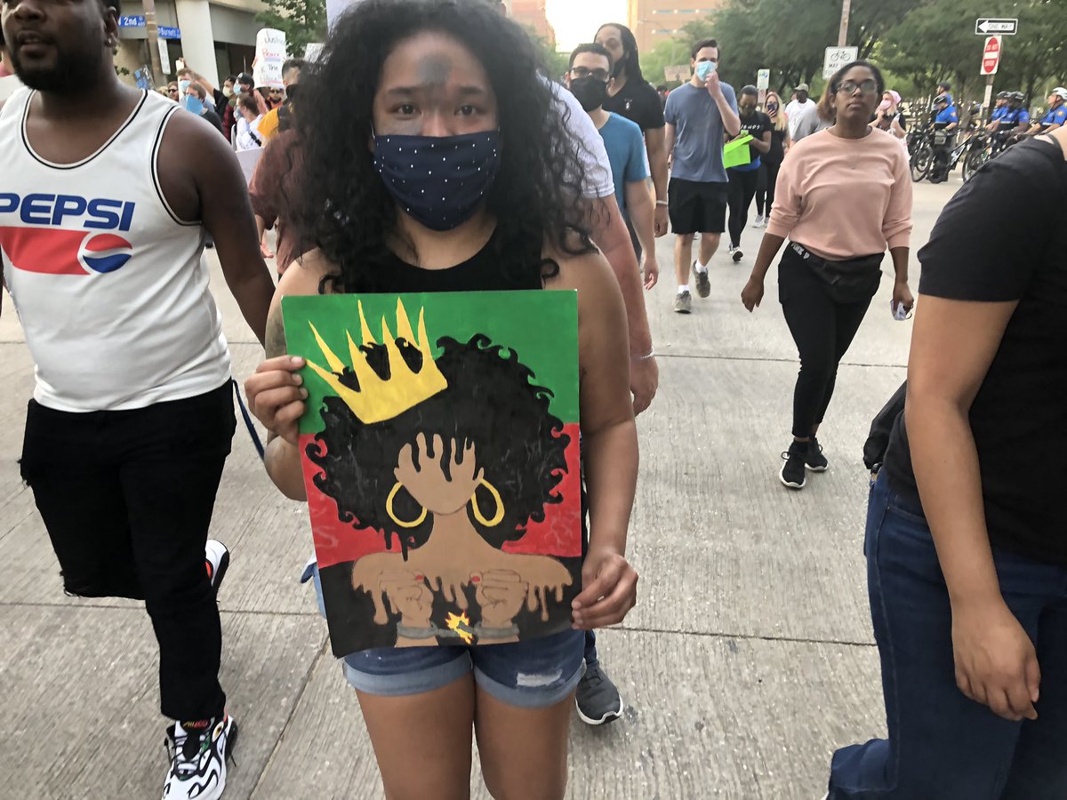 This woman said her 11-year-old daughter drew this sign.