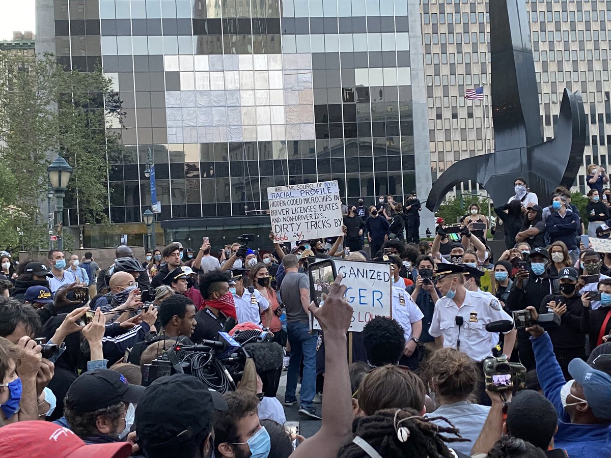 derek_m_norman's tweet photo. A handful of police were surrounded by demonstrators in Foley Square. “NYPD, take a knee” was chanted. The police obliged, taking a knee. And for one moment, amid such national unrest, the police had knelt in solidarity with the marchers - and the crowd erupted into applause. https://t.co/6gzG9qKxnm