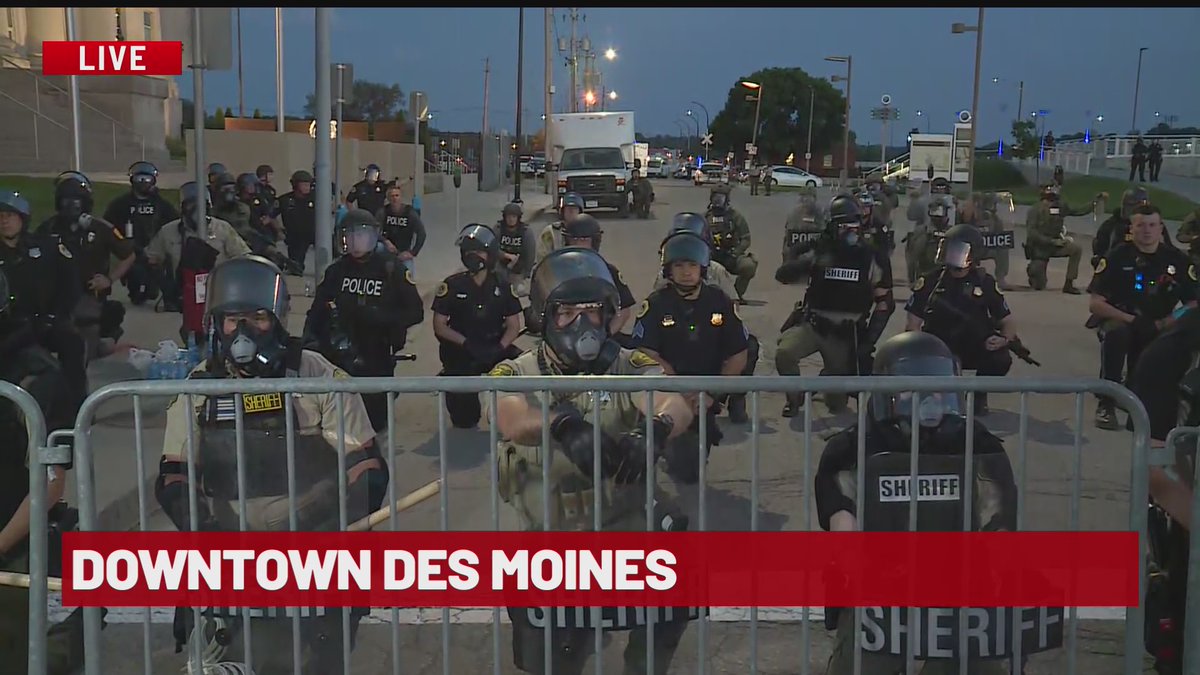 Incredibly powerful image in Des Moines tonight as law enforcement takes a knee with peaceful protesters downtown.