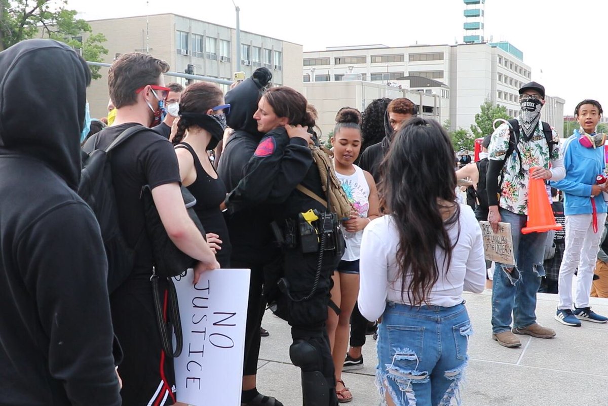 NEStatePatrol's tweet image. Earlier tonight at the Capitol during a peaceful protest, a young female suffered a medical incident. Protesters and Trooper Gardine (an EMT) worked together to care for her until paramedics could arrive. 

A touching moment when the crowd applauded Trooper Gardine’s efforts.