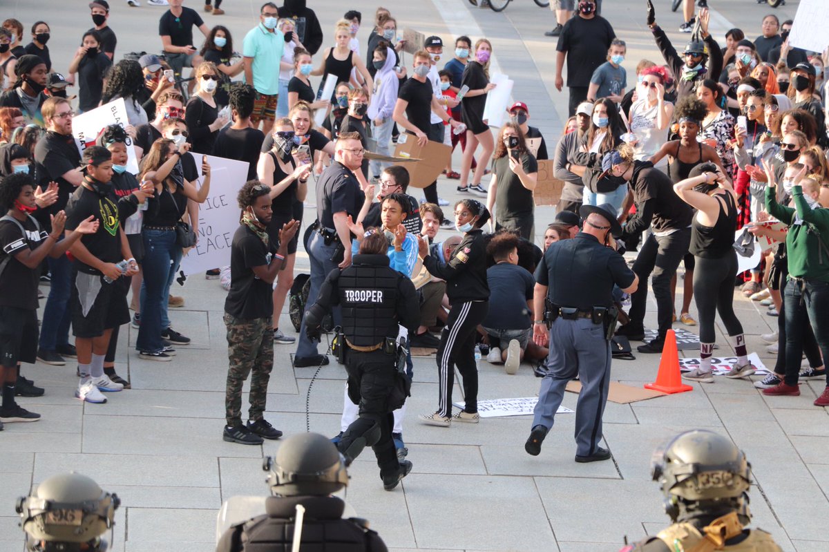NEStatePatrol's tweet image. Earlier tonight at the Capitol during a peaceful protest, a young female suffered a medical incident. Protesters and Trooper Gardine (an EMT) worked together to care for her until paramedics could arrive. 

A touching moment when the crowd applauded Trooper Gardine’s efforts.